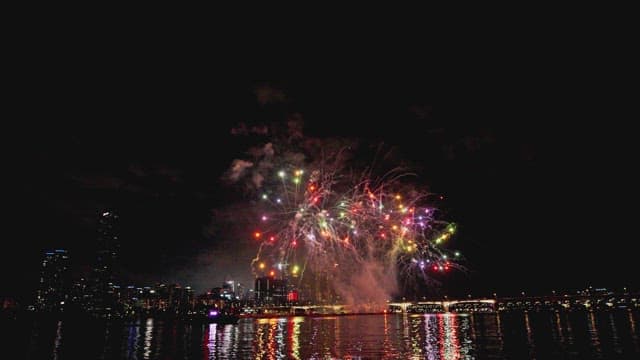 Fireworks Display Over The City Waterfront