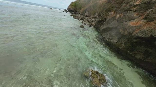 Rocky coastline with clear sea