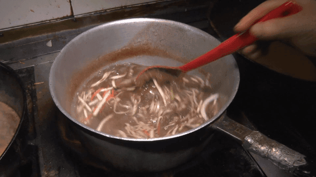 Noodle soup boiling with seasoning powder