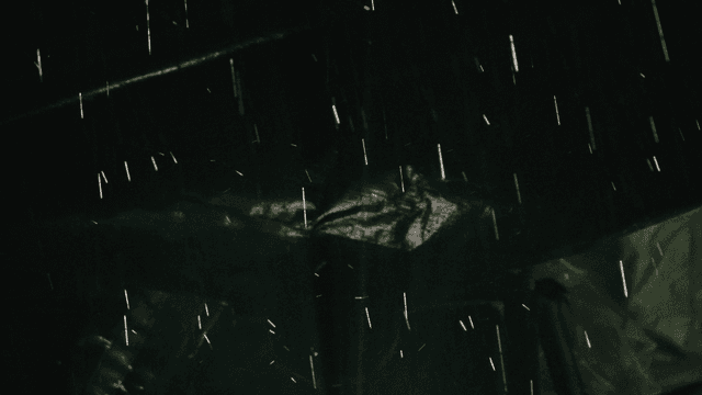 Rain falling on dark night