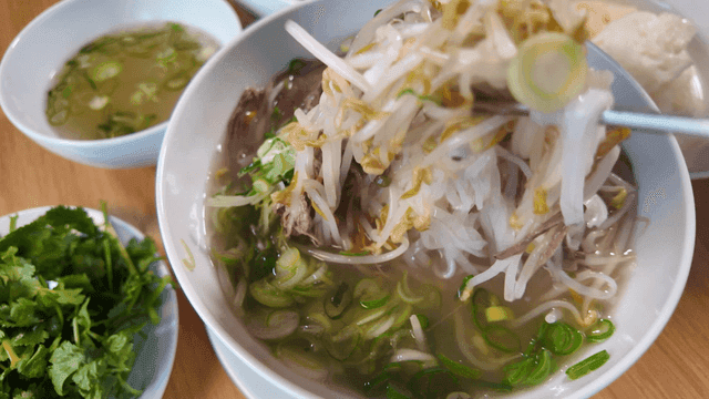 Rice noodles served with fresh bean sprouts and green onions