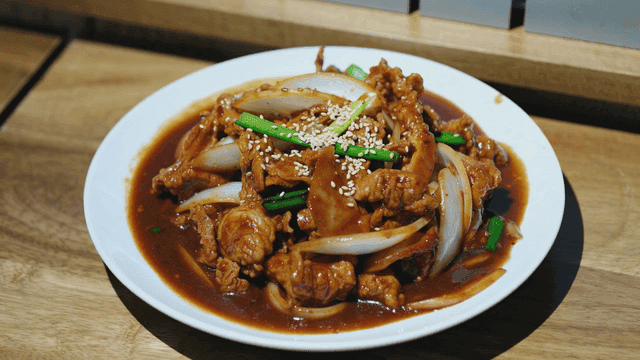 Plate of spicy stir-fried pork
