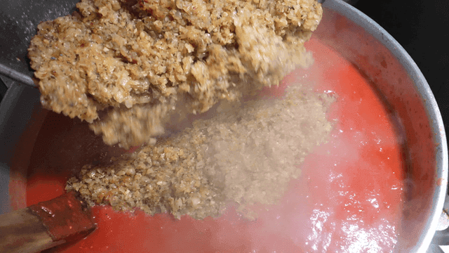 Sauteed onions poured over tomato sauce
