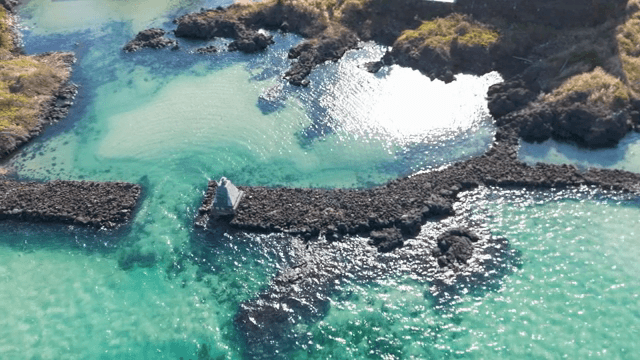 Coastal rocks and clear turquoise water