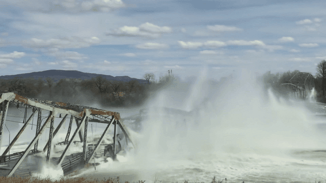 Bridge collapsing into river