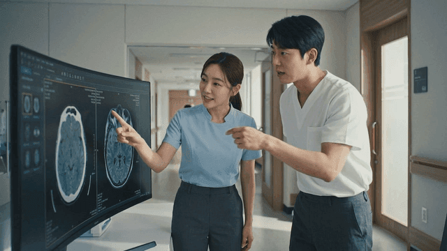 Doctors discussing brain scans in a hospital