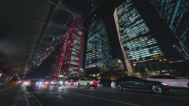 Bustling City Nightlife with Glowing Skyscrapers