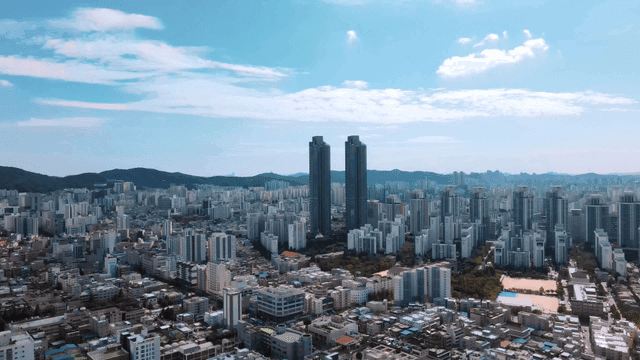 Cityscape with tall buildings on clear day