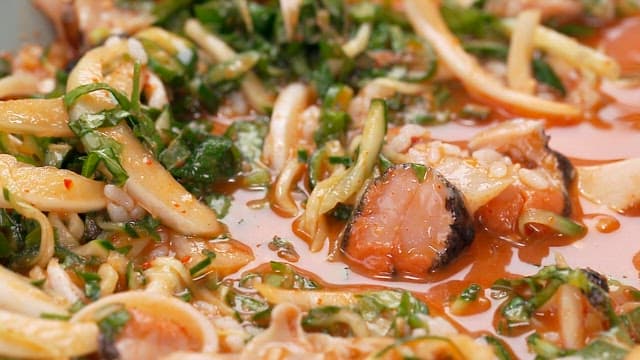 Spicy and Refreshing Raw Fish Soup with Plenty of Seafood and Vegetables