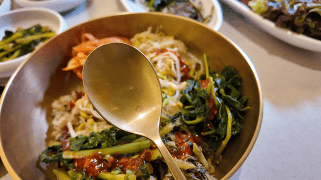 Bowl of bibimbap with various vegetables