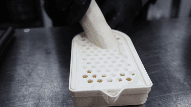 White yam grated on metal grater