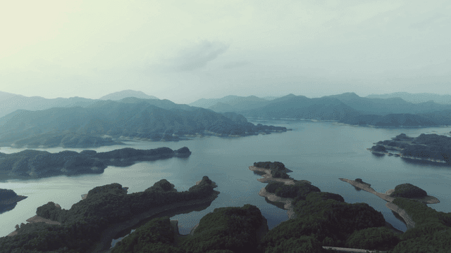 Tranquil lake surrounded by mountains