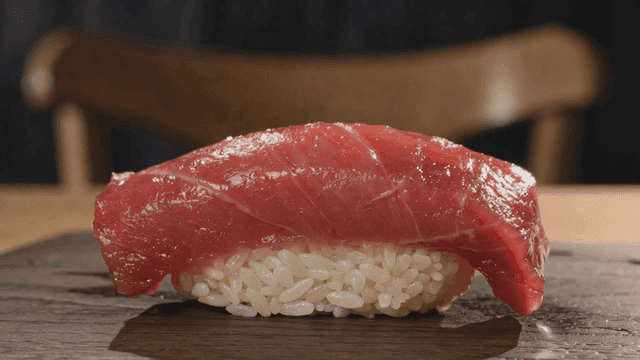 Fresh tuna sushi on wooden board