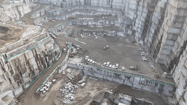 Large quarry with heavy machinery