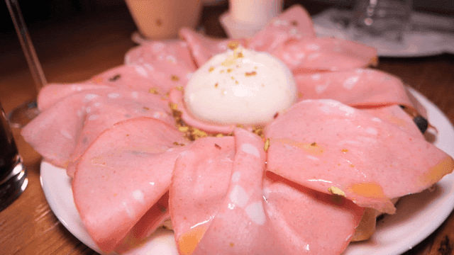 Mortadella pizza with ham and cheese and cola