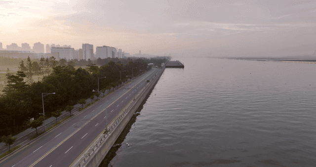 Quiet coastal road at dawn