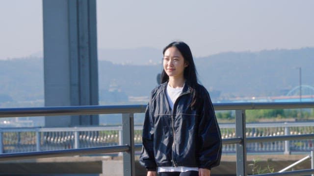 Woman checking smartwatch outdoors