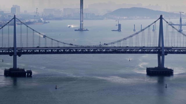 Large bridge over a calm river