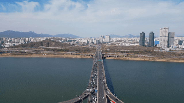 Bustling city with a busy bridge