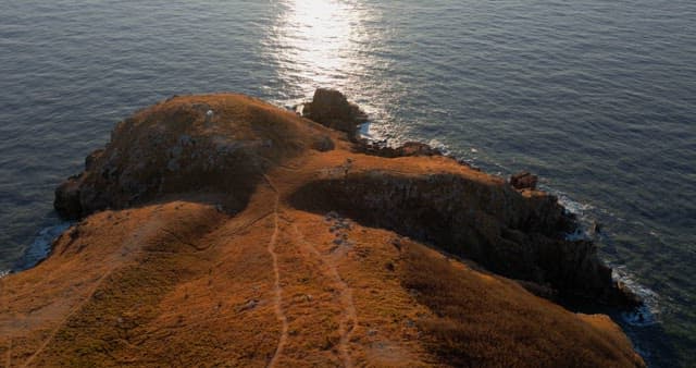 Sunset over a tranquil coastal seascape