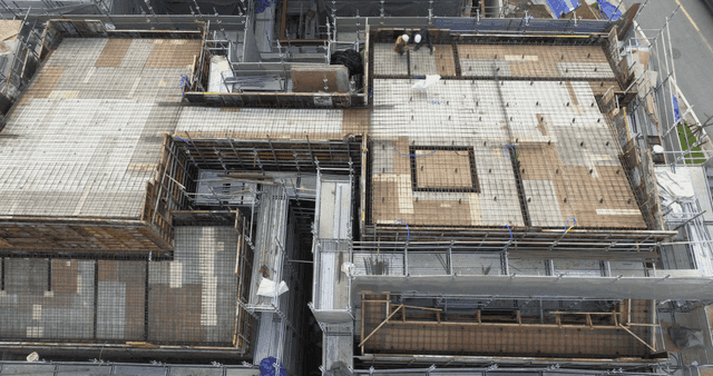 Construction site with workers and scaffolding