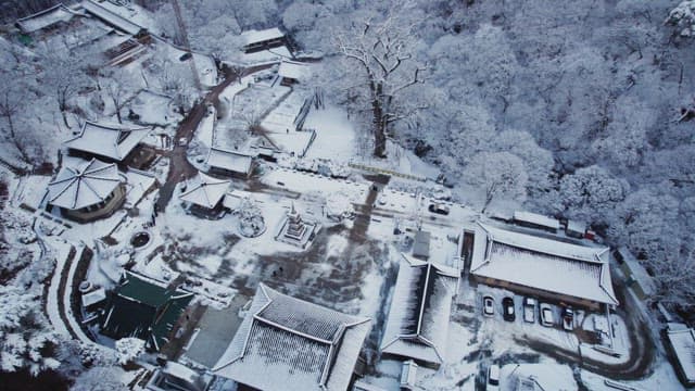 Snow-covered traditional Korean temple