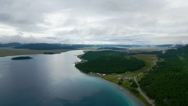 Vast lake surrounded by lush forests