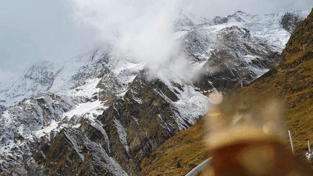 Glass of drink with mountain view