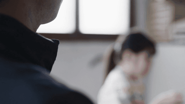 Back of father looking at girl