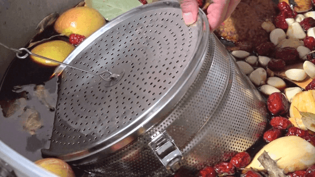 Herbal ingredients and soy sauce prepared in pot