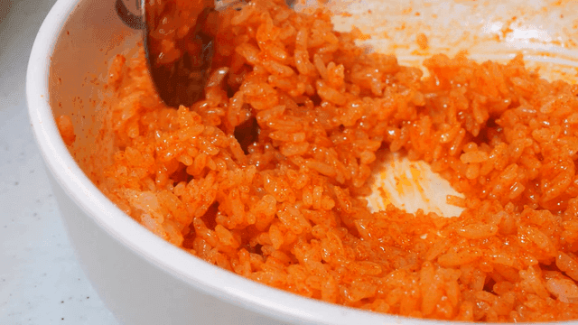 Red pepper paste bibimbap mixed in bowl