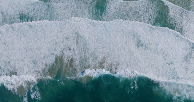 Waves Crashing on Shoreline