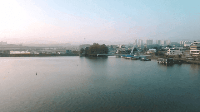 Tranquil city landscape by river