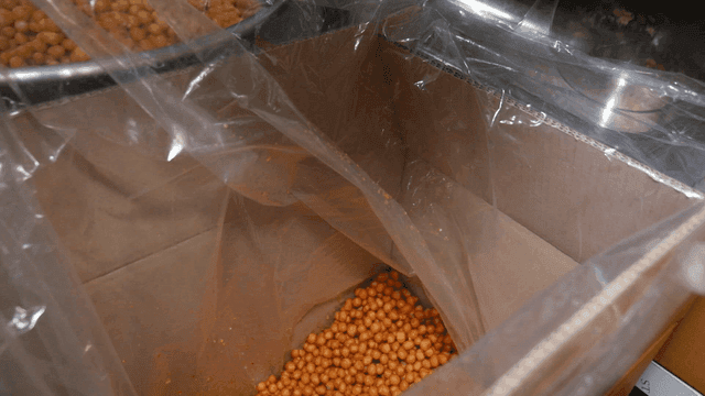 Scene of sifting gangjeong crumbs through a sieve