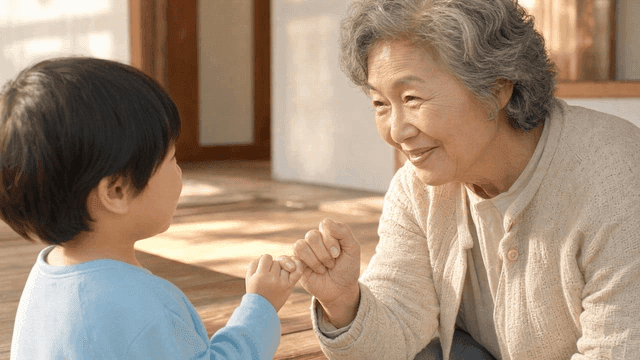 Warm finger promise between grandmother and child