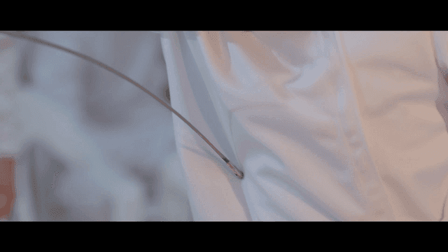 Fencer in white uniform