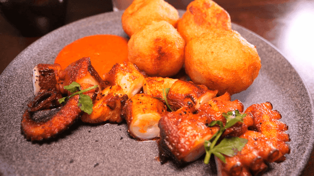 Grilled octopus and fried potato balls