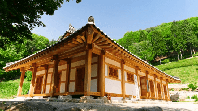 Traditional Korean house in a lush forest