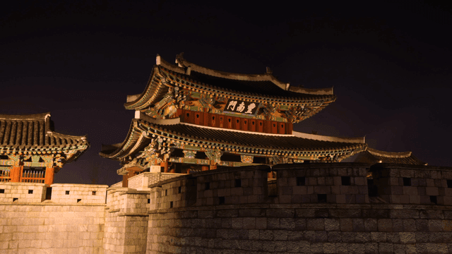 Traditional Hanok door illuminated at night