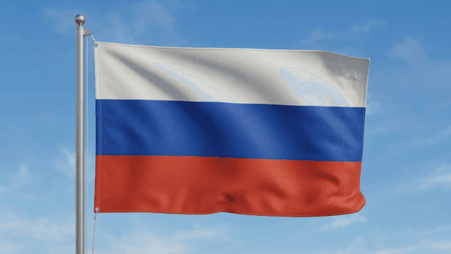 Russian flag fluttering against clear sky
