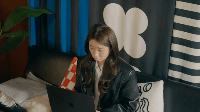 Woman with a desperate expression while working on her laptop