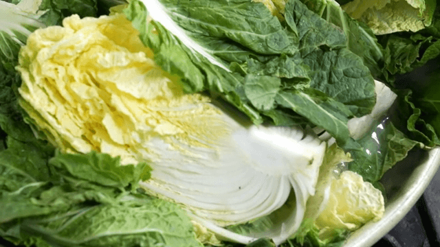 Napa cabbage in a boiling pot
