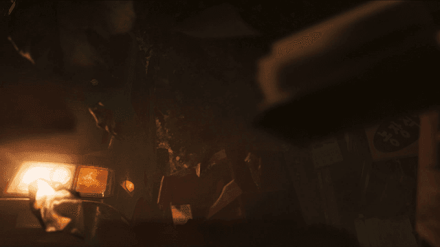 Traffic accident involving green truck with its headlights on at night