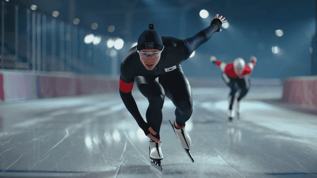 Speed skaters racing on an ice rink