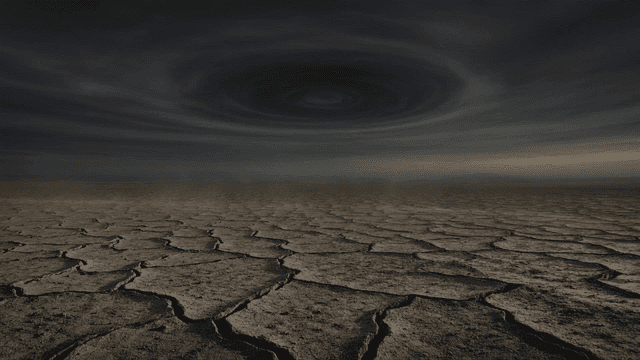 Desolate ground beneath swirling sky