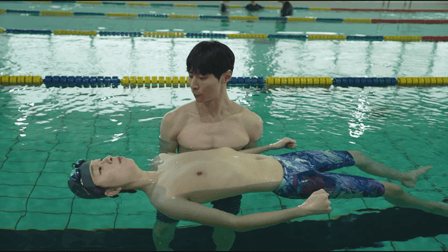 Swimming lessons with coach at pool