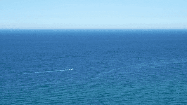 Kitesurfers enjoying the ocean waves