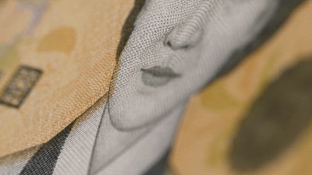 Surface of banknotes printed with a special substance that prevents counterfeiting