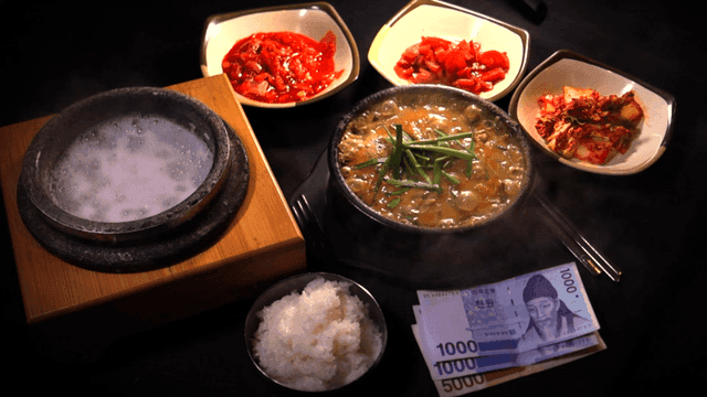 Loach soup and hot stone pot rice with Korean banknotes