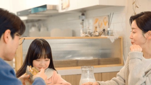 Family enjoying breakfast together